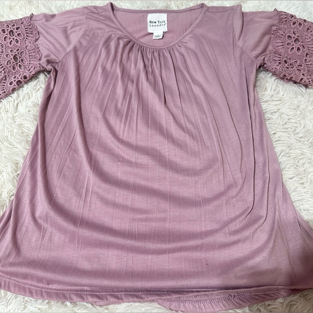 Very cute light purple t-shirt. “New York Laundry” size small. True to size!